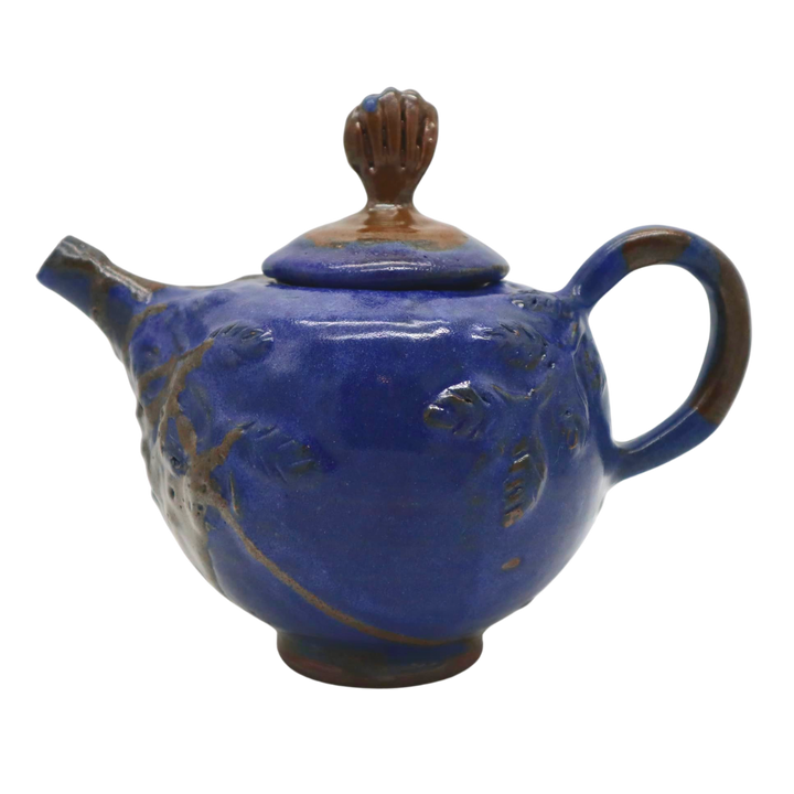 Teresita Baldo	Sagada Pottery Ceramic Tea Set with Four Cups