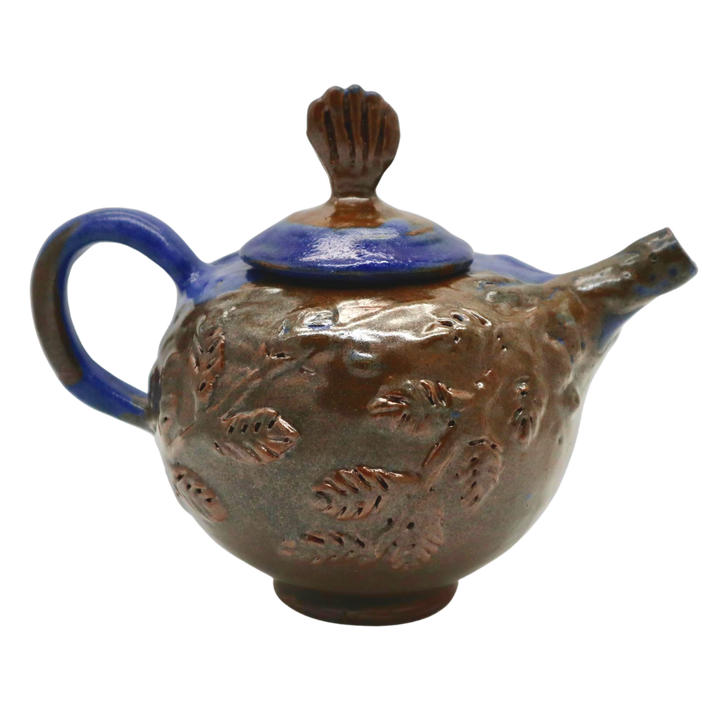 Teresita Baldo	Sagada Pottery Ceramic Tea Set with Four Cups